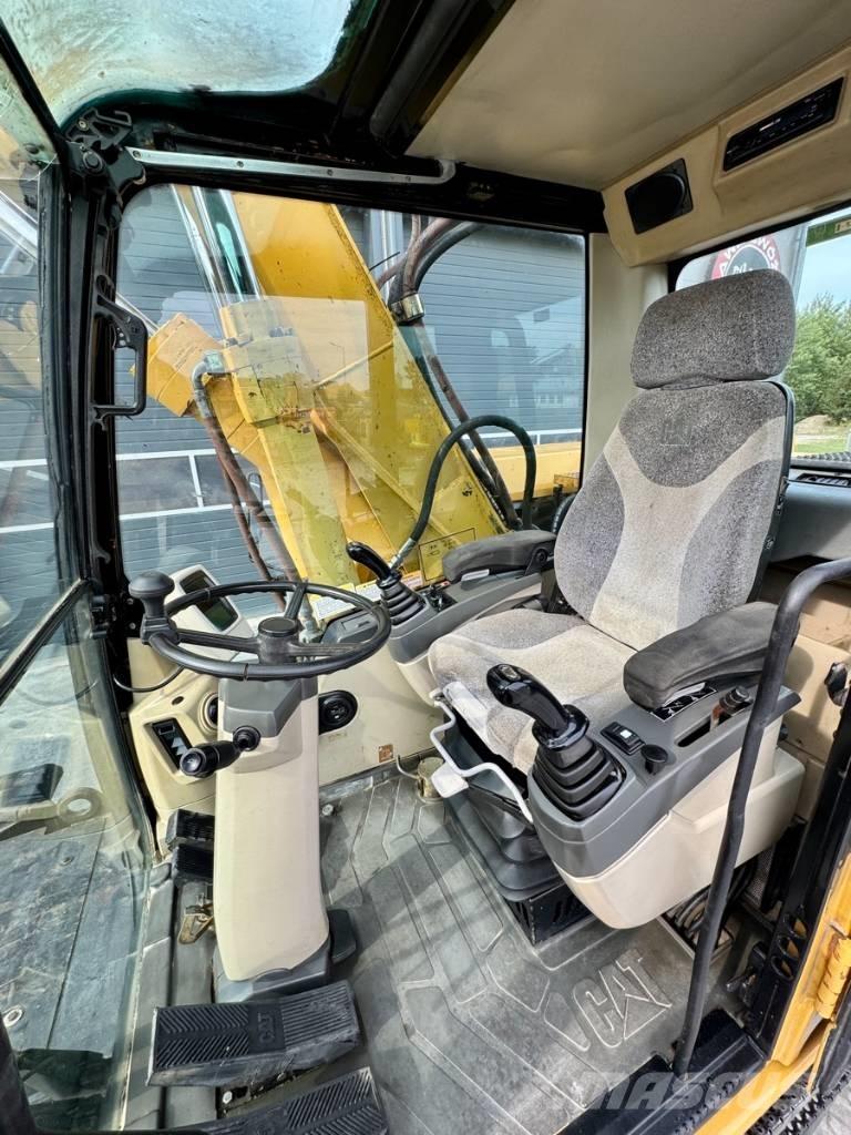 CAT M 318 C Bageri na kotačima