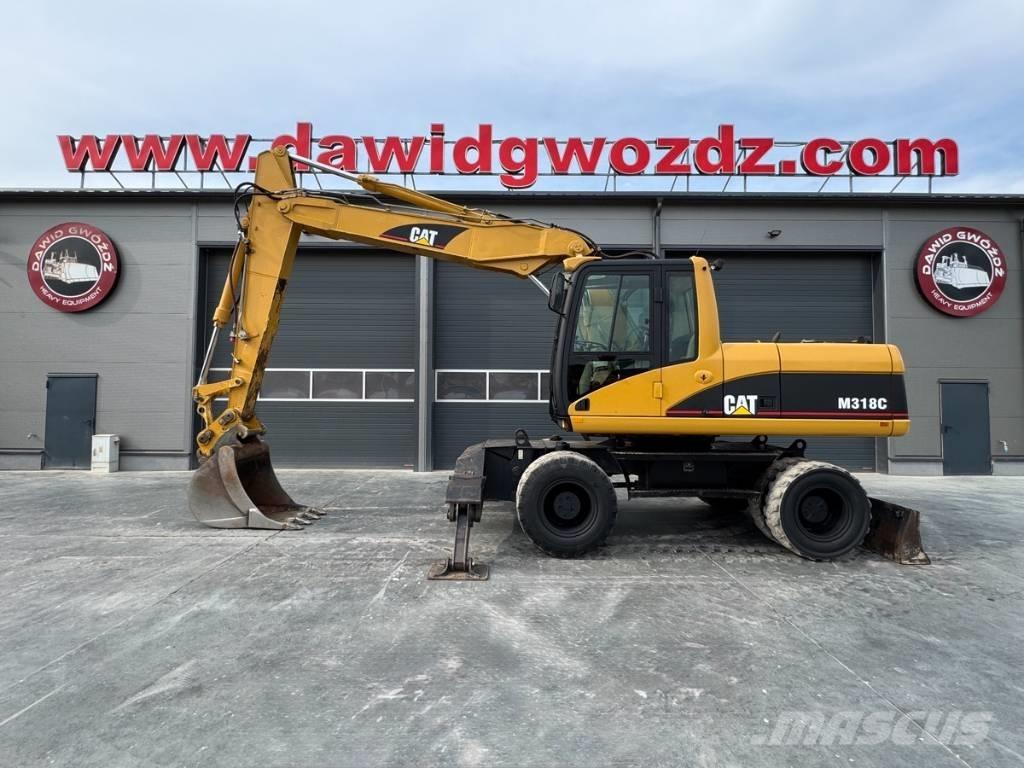 CAT M 318 C Bageri na kotačima
