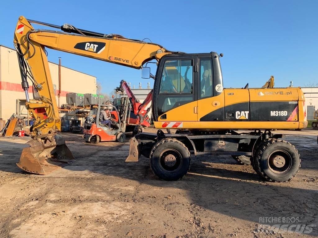 CAT M 318 D Bageri na kotačima