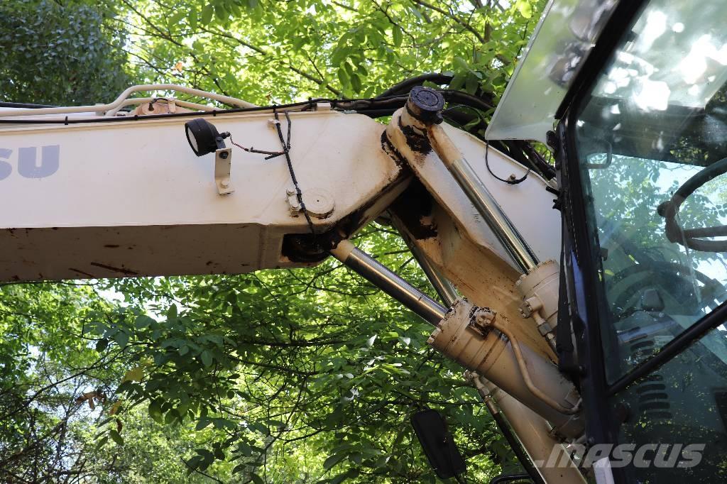 Komatsu PW 140-7 Utovarni rovokopači