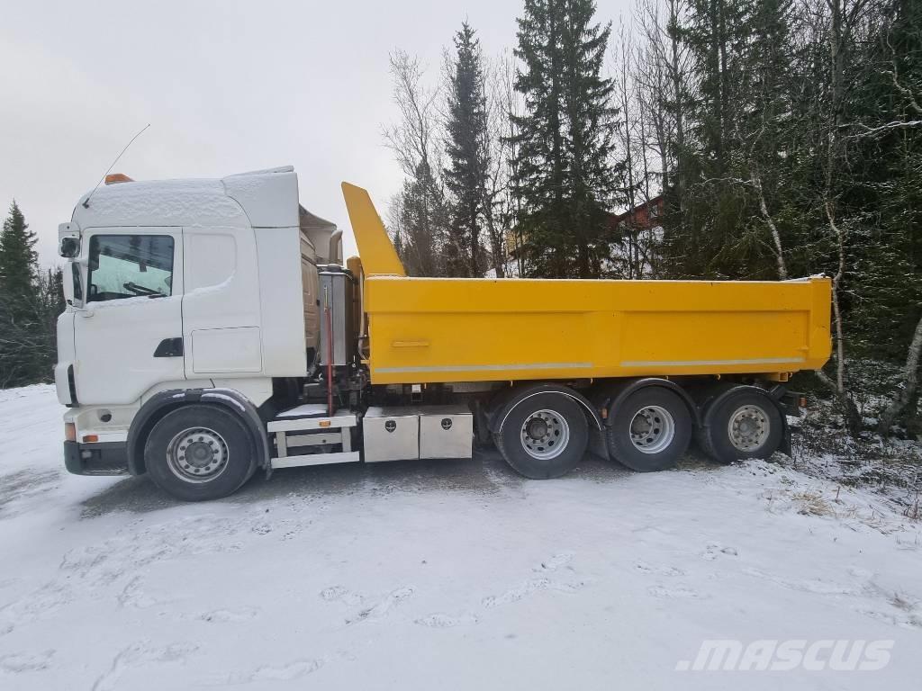 Scania R 560 LB 8X4 Rol kiper kamioni s kukama za dizanje