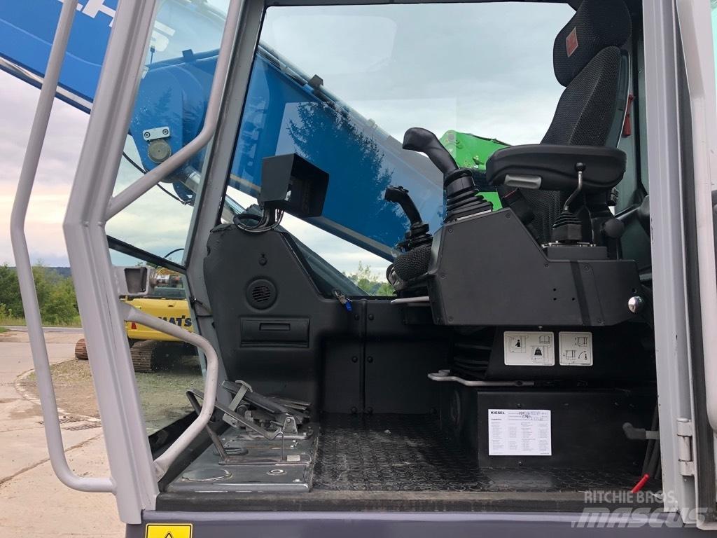 Fuchs MHL320 Bageri za manipuliranje materijalom / otpadom