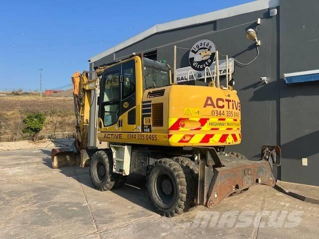 Komatsu PW 148 Bageri na kotačima