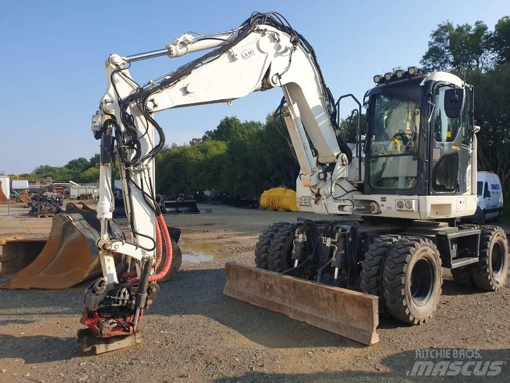 Komatsu PW118MR-11 Bageri na kotačima