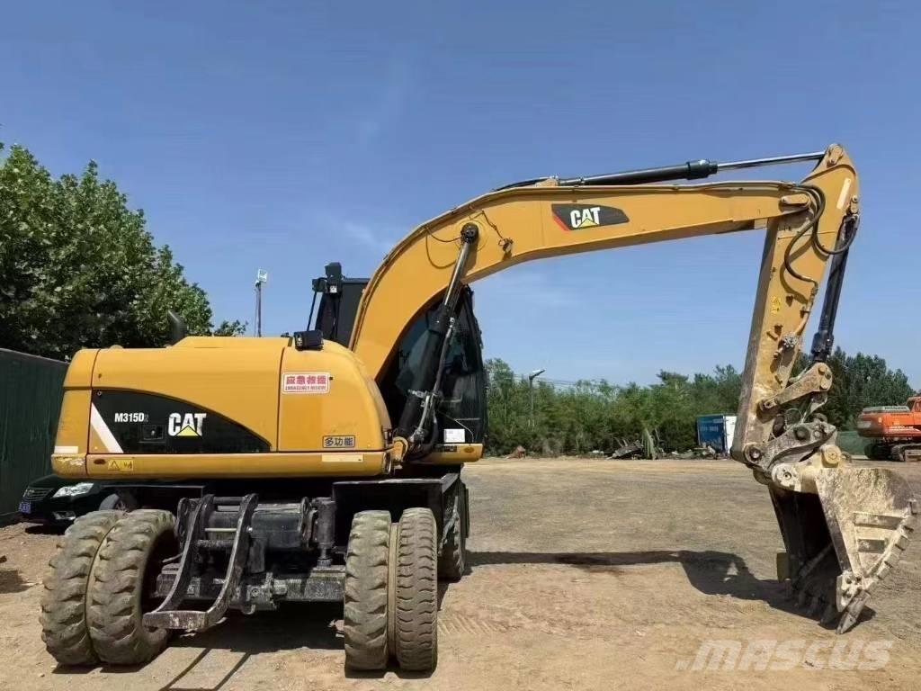 CAT M 315 D Bageri na kotačima