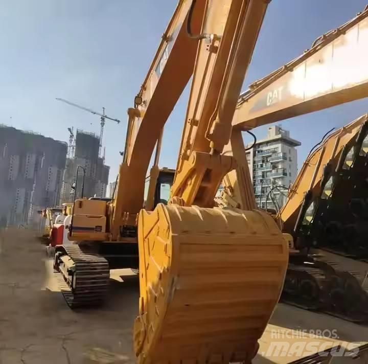 CAT CAT323B Midi bageri 7t – 12t