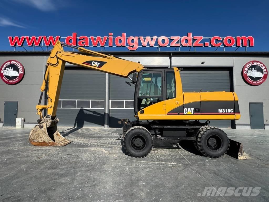 CAT M 318 C Bageri na kotačima