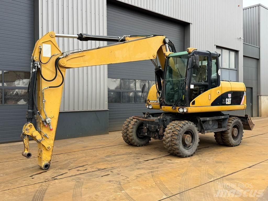 CAT M315D Bageri na kotačima