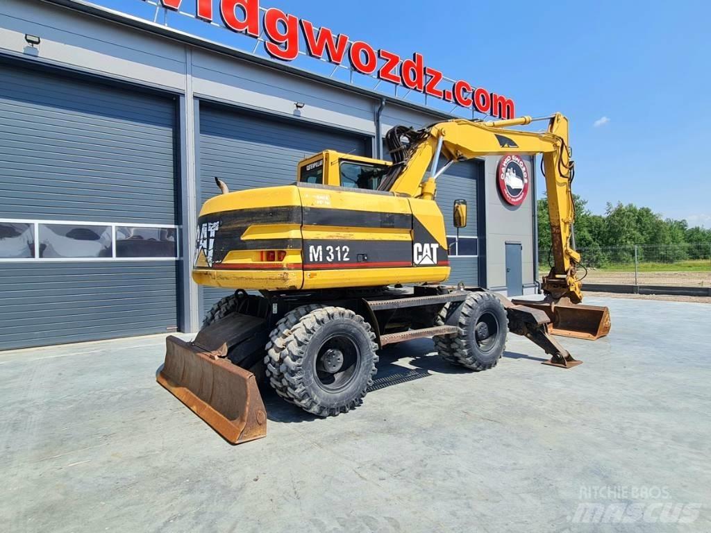 CAT M 312 Bageri na kotačima