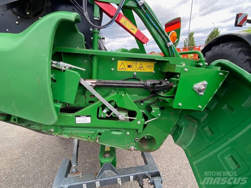 John Deere T 670 i Kombajni