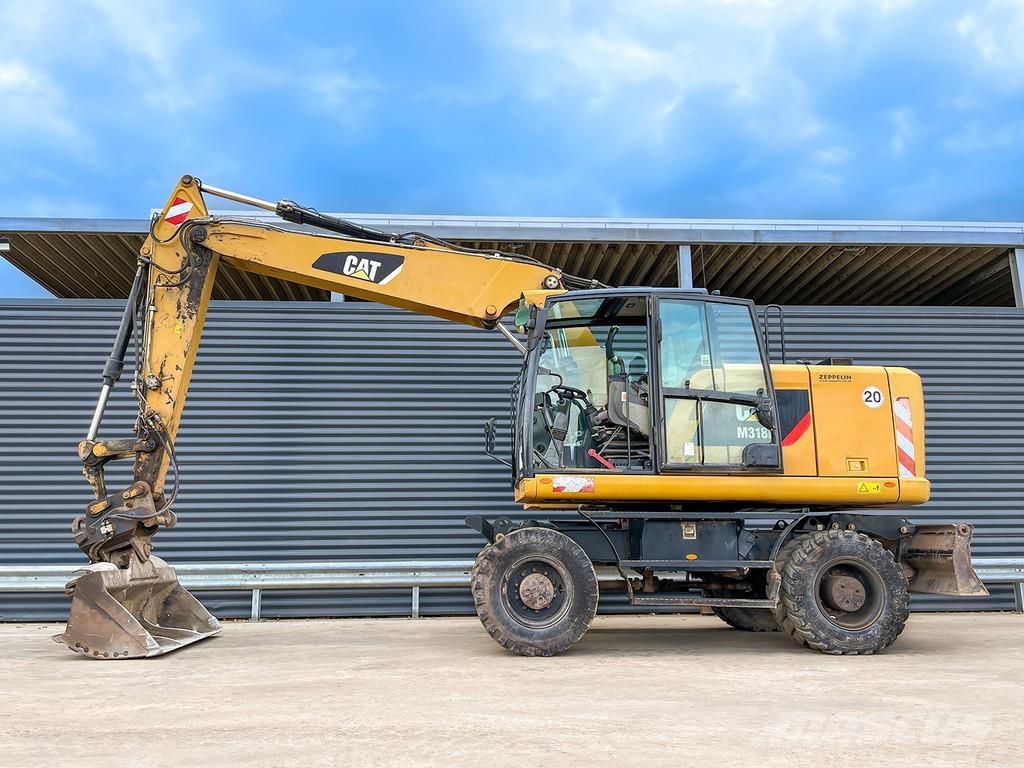 CAT M318F Bageri na kotačima