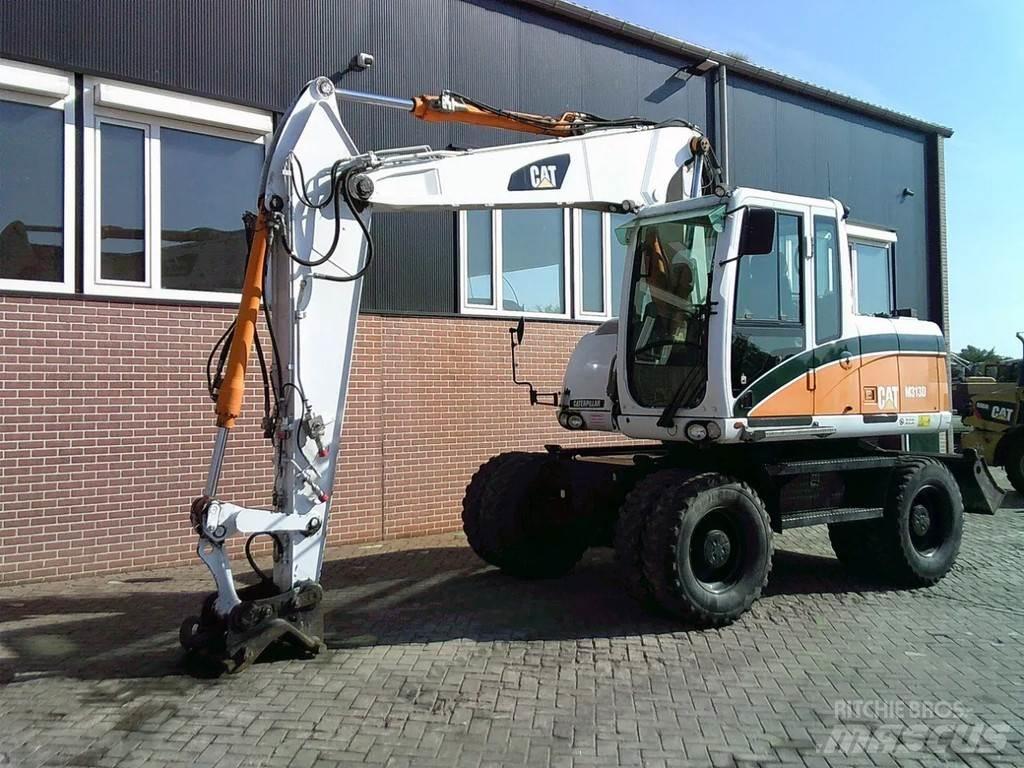 CAT M313D Bageri na kotačima
