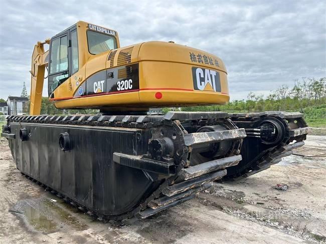 CAT 320 C Amfibijski bageri