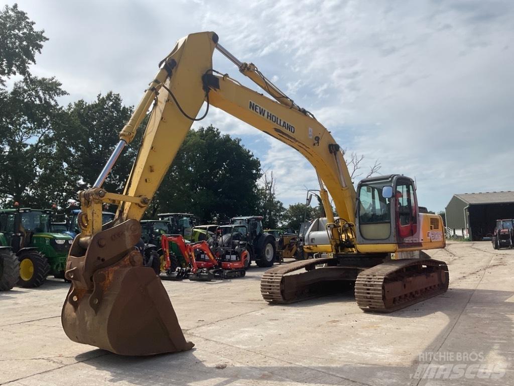 New Holland E 305 Bageri gusjeničari