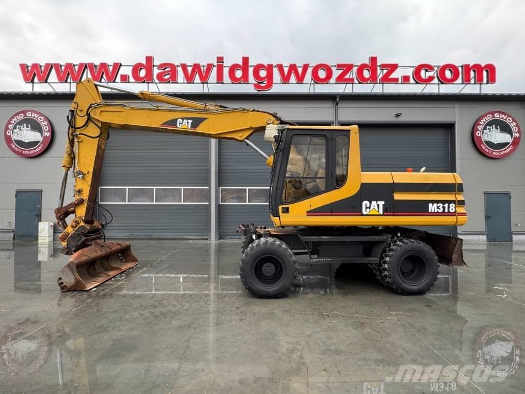 CAT M 318 Bageri na kotačima