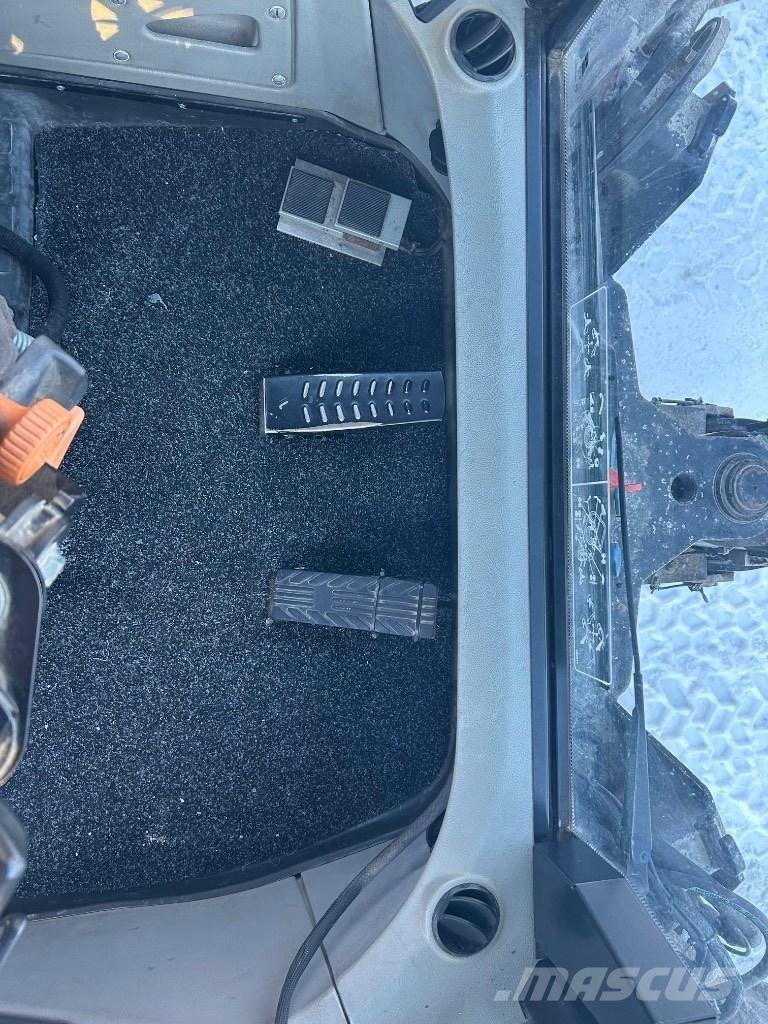 Huddig 1260 C Utovarni rovokopači