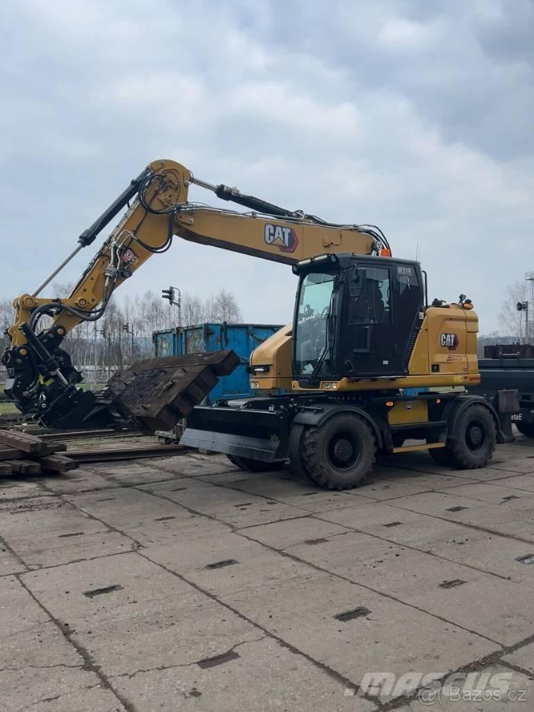 CAT M 319 Bageri na kotačima