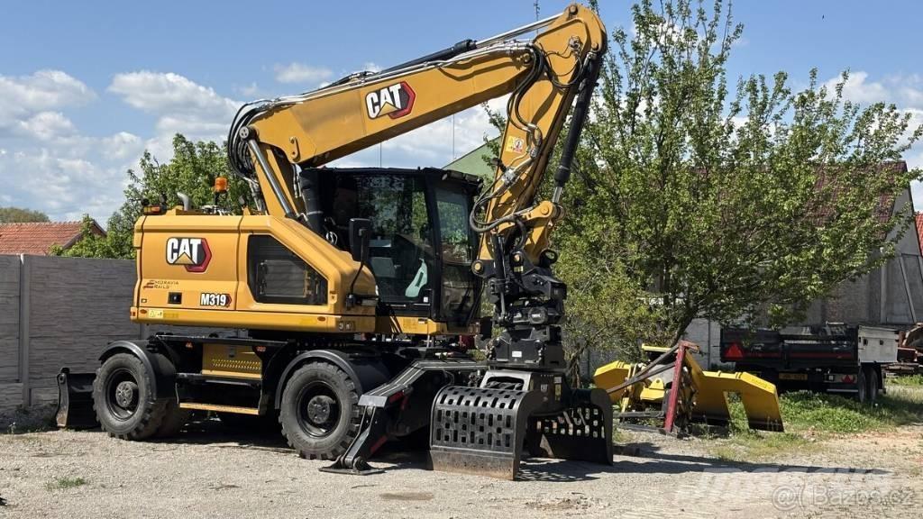 CAT M 319 Bageri na kotačima
