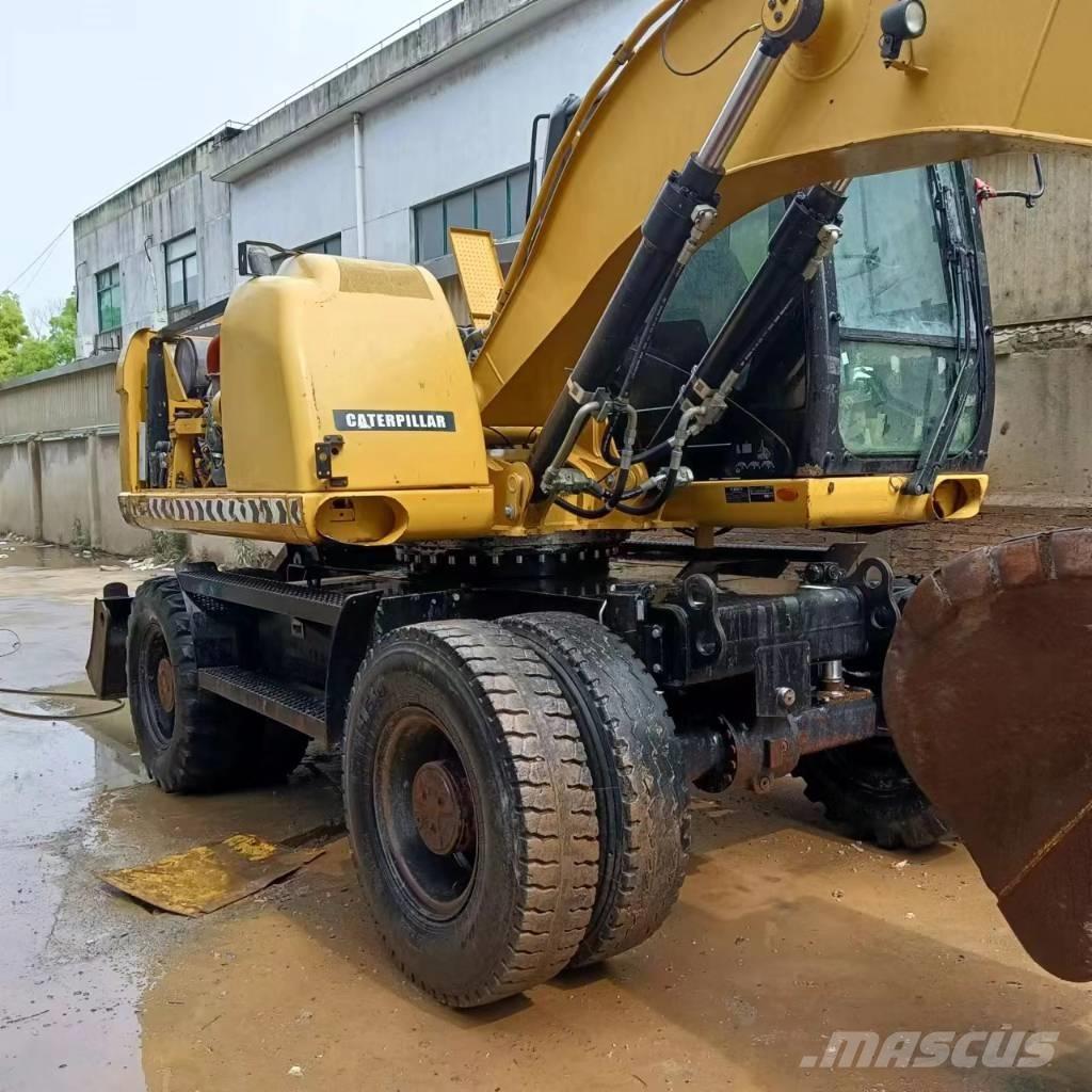 CAT M315D2 Bageri na kotačima