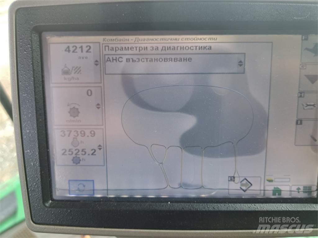 John Deere W650 Kombajni