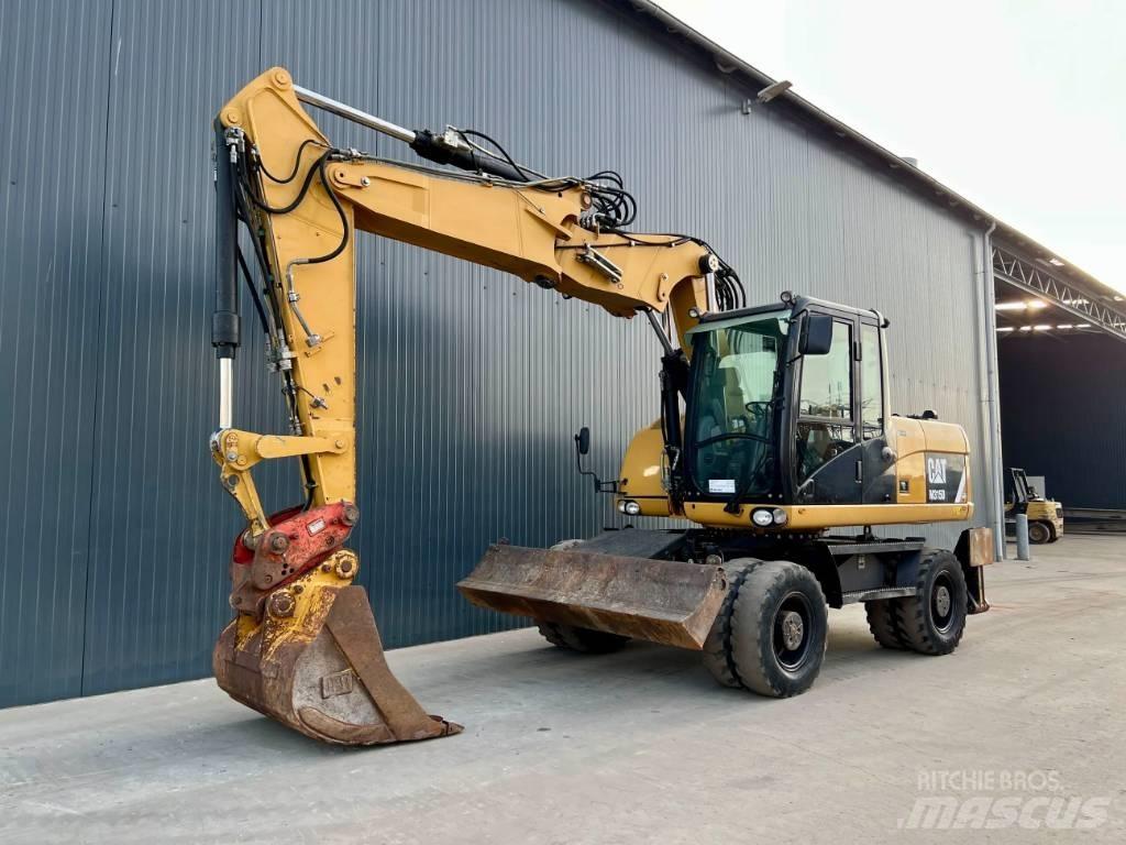 CAT M315D Bageri na kotačima