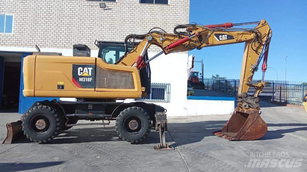 CAT M318F Bageri na kotačima