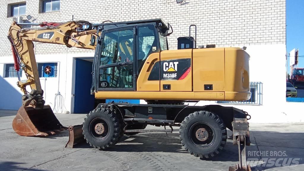 CAT M318F Bageri na kotačima