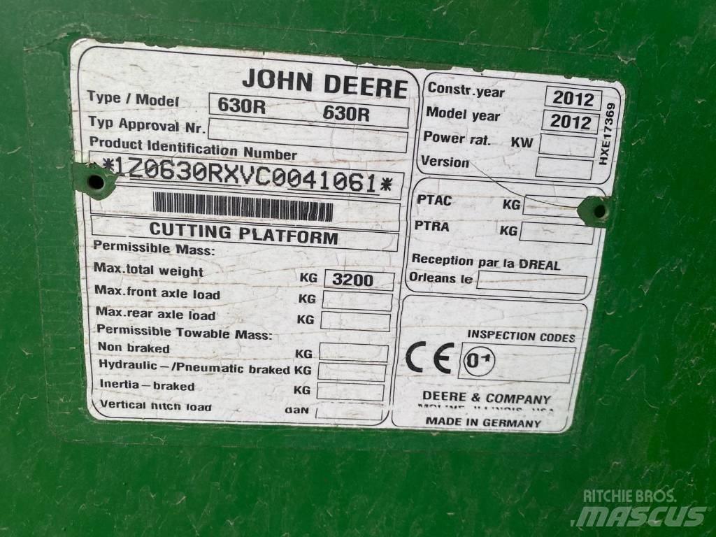 John Deere T 670 i Kombajni