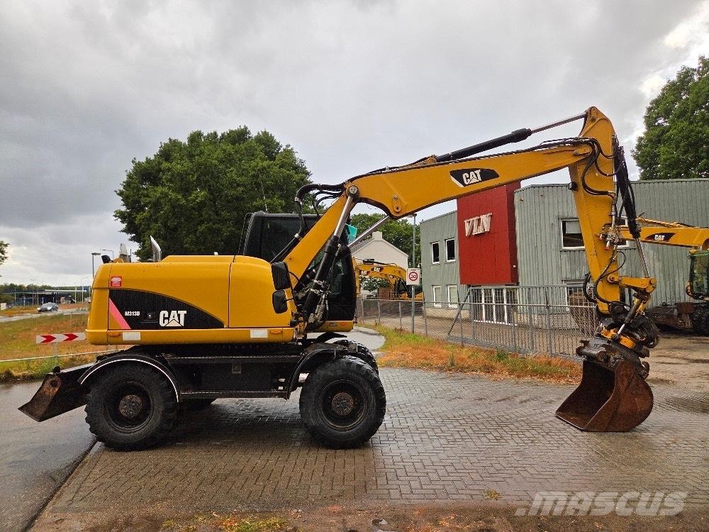 CAT M313D Bageri na kotačima