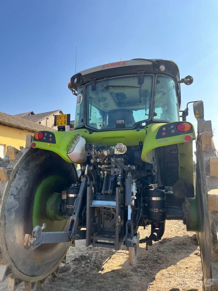 CLAAS ARION 470 Traktori
