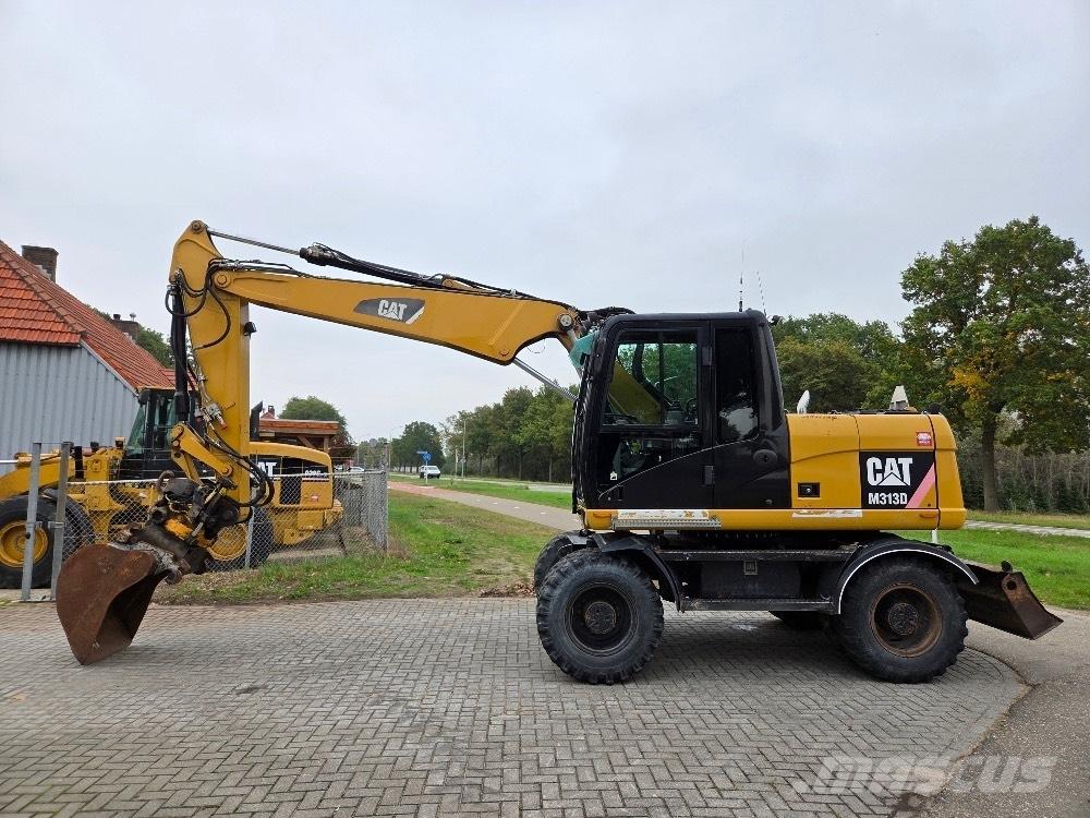 CAT M313D Bageri na kotačima