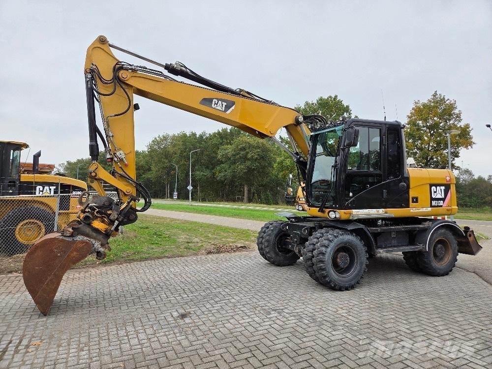 CAT M313D Bageri na kotačima
