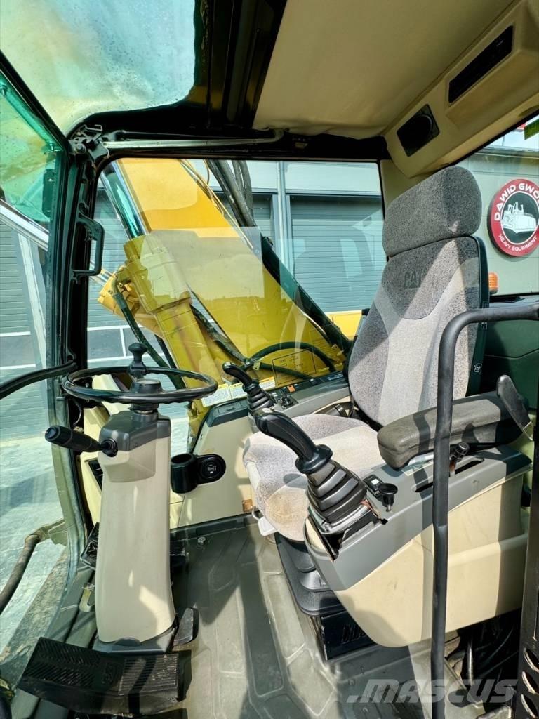 CAT M 318 C Bageri na kotačima