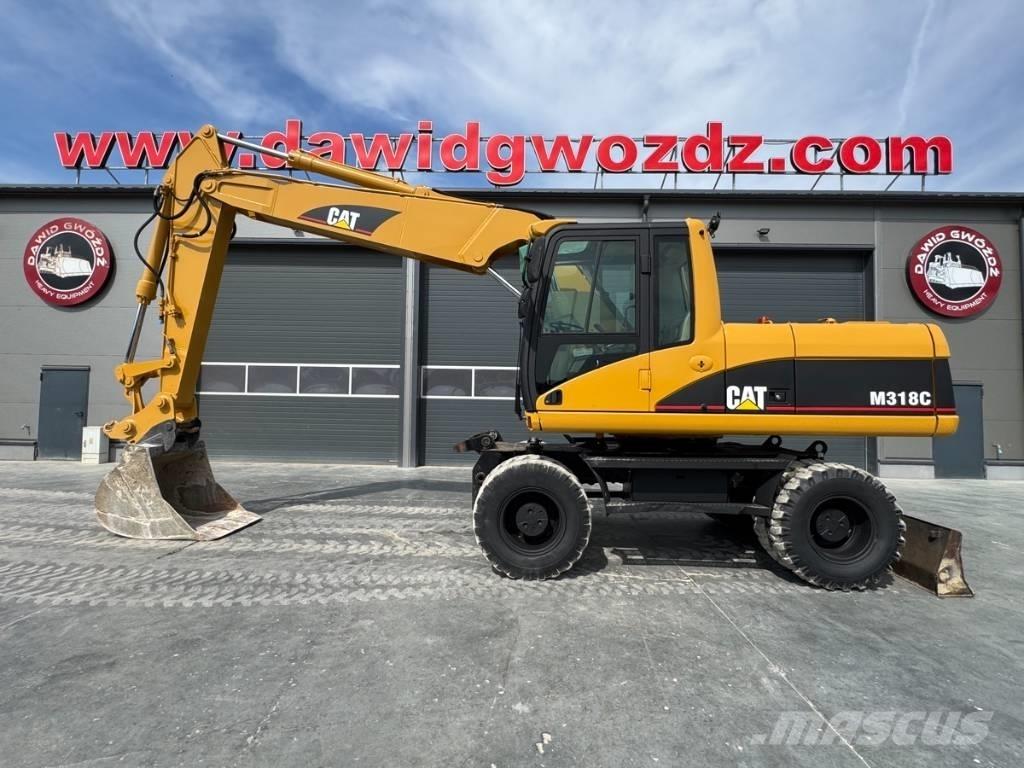 CAT M 318 C Bageri na kotačima