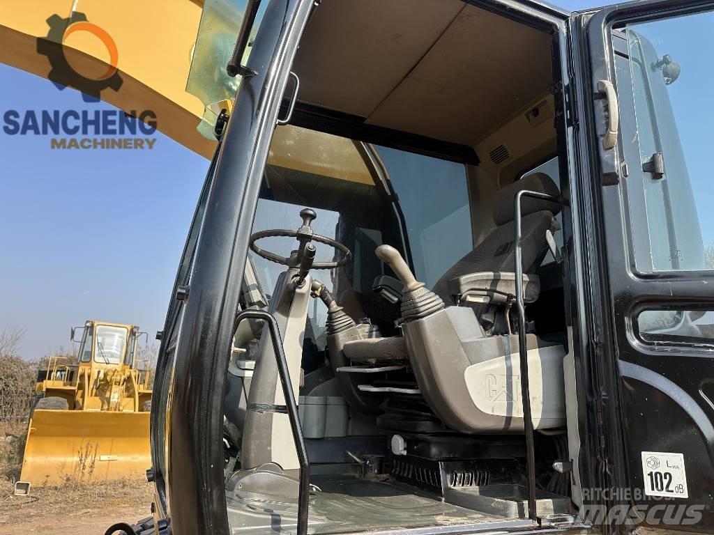 CAT M320D Bageri na kotačima