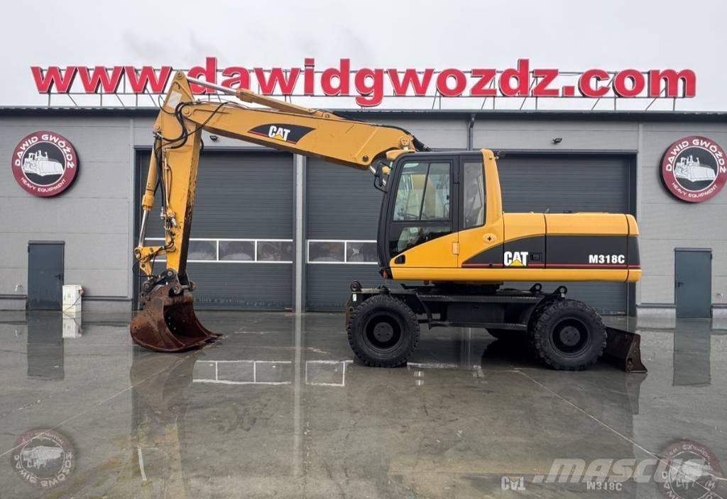 CAT M 318 C Bageri na kotačima