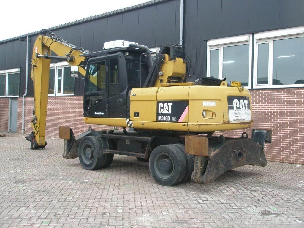 CAT M318D Bageri na kotačima
