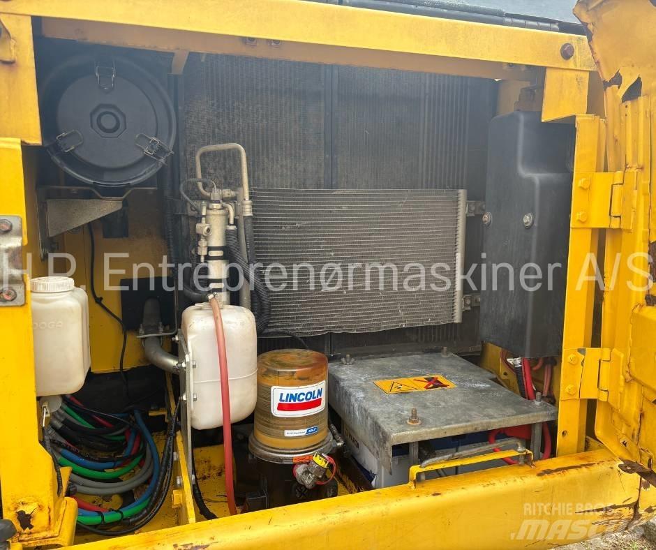 New Holland E 135 B Bageri gusjeničari