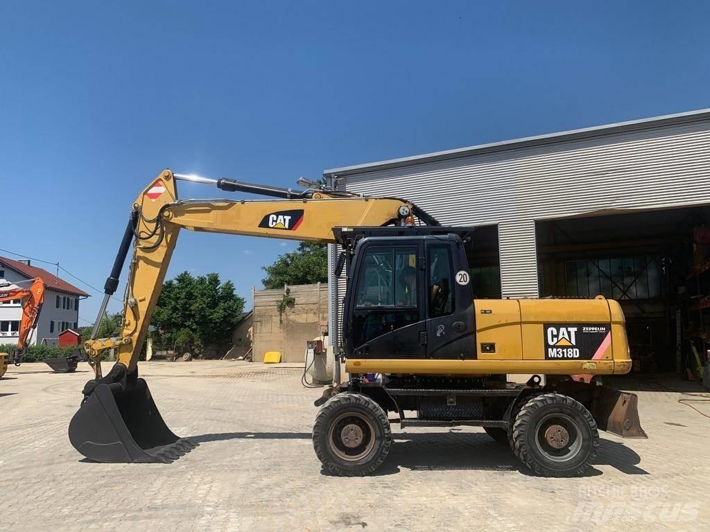 CAT M 318 D Bageri na kotačima