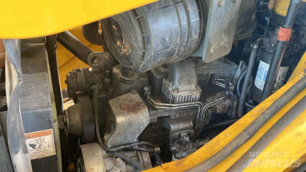 New Holland B 95 B Utovarni rovokopači