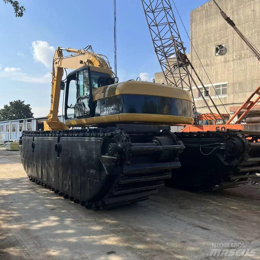 CAT 320 C Amfibijski bageri