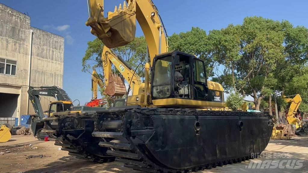 CAT 320 C Amfibijski bageri