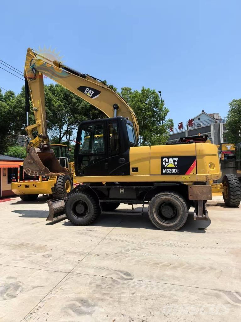 CAT M 320D2 Bageri na kotačima