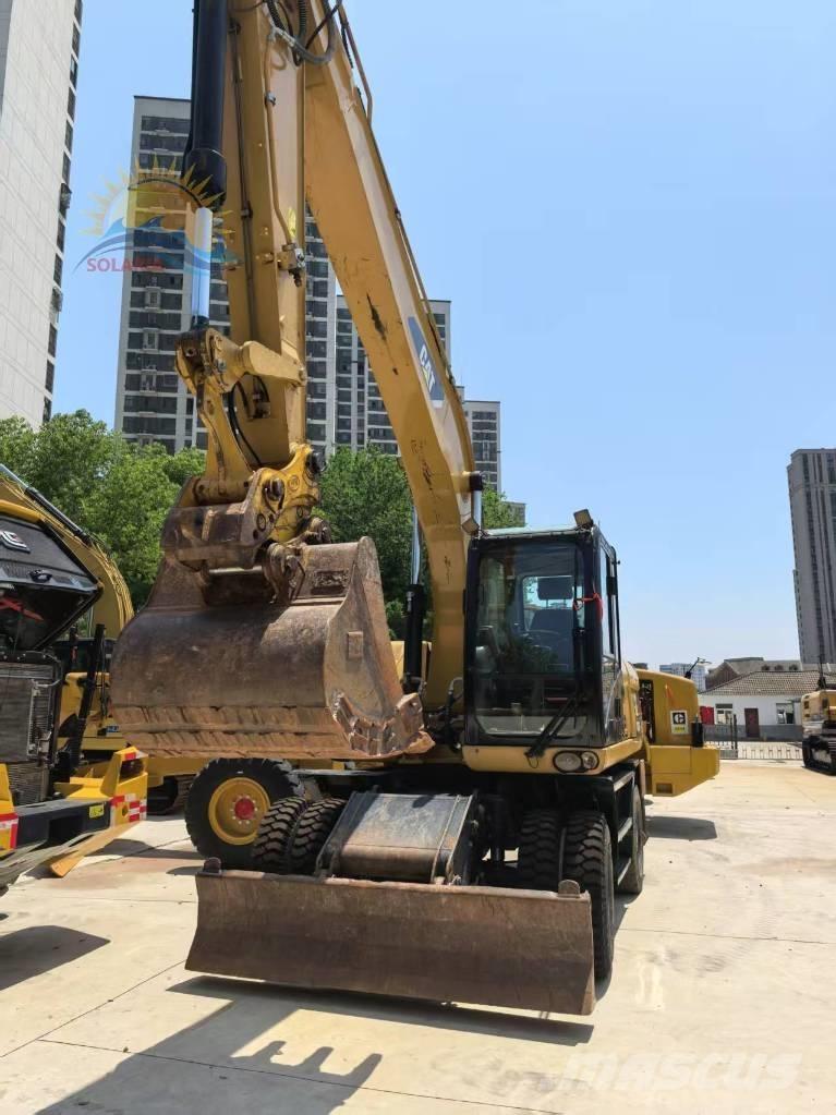 CAT M 320D2 Bageri na kotačima