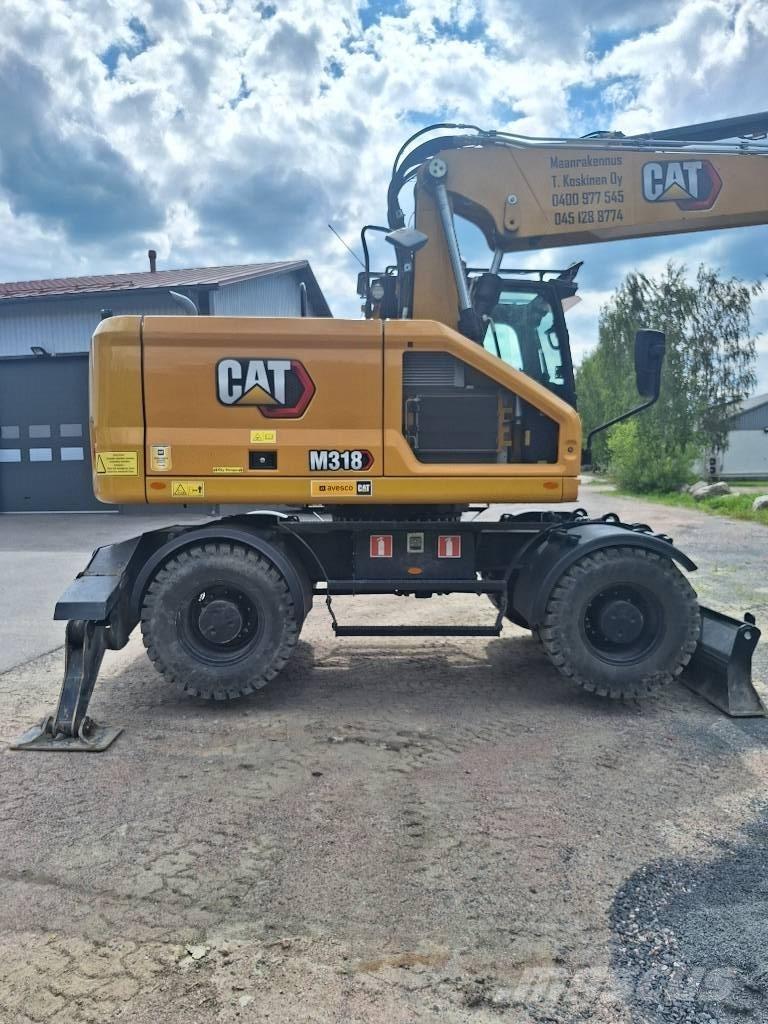 CAT M 318 Bageri na kotačima