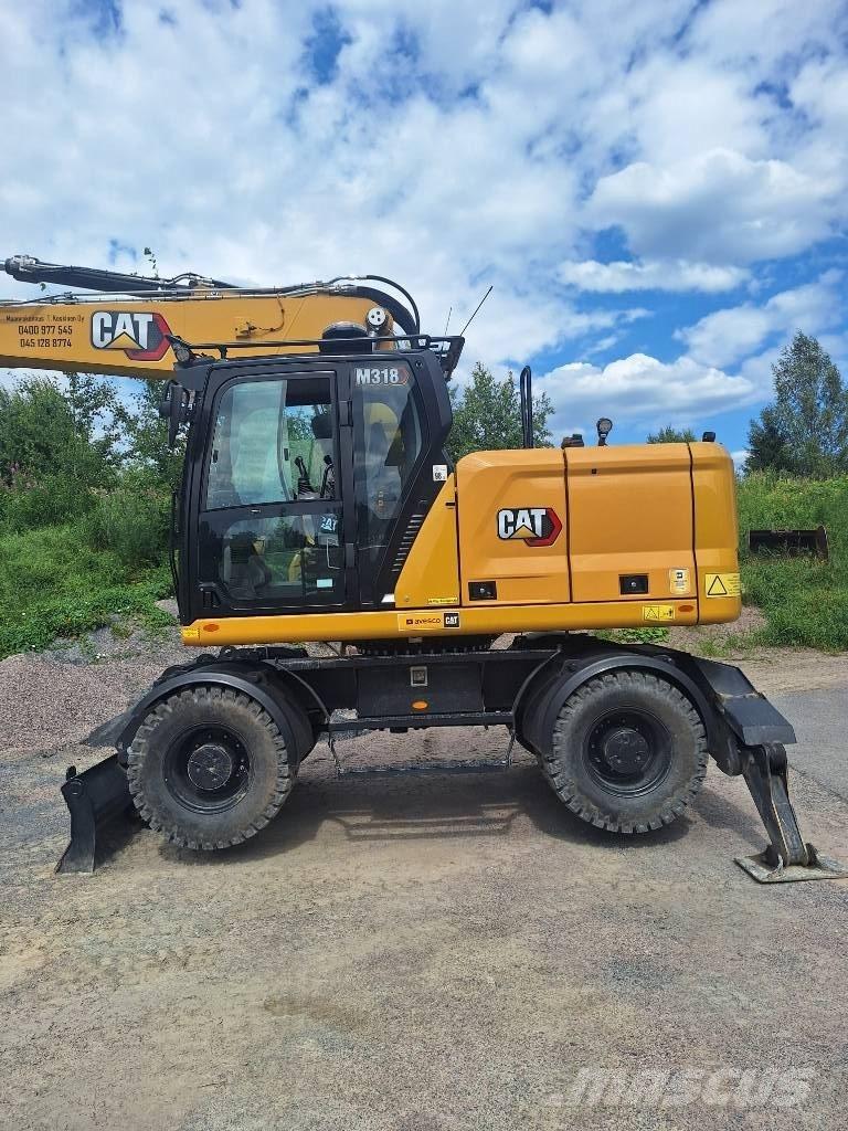CAT M 318 Bageri na kotačima