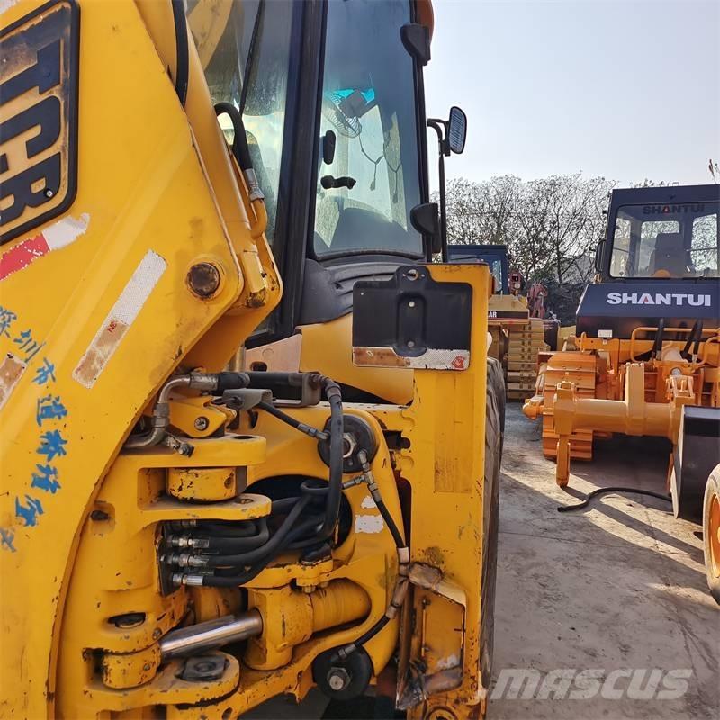 JCB 4 CX Bageri gusjeničari