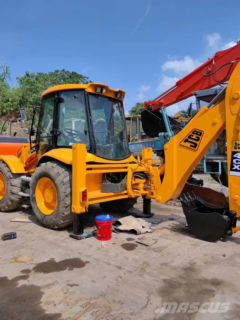 JCB 4 CX Bageri gusjeničari