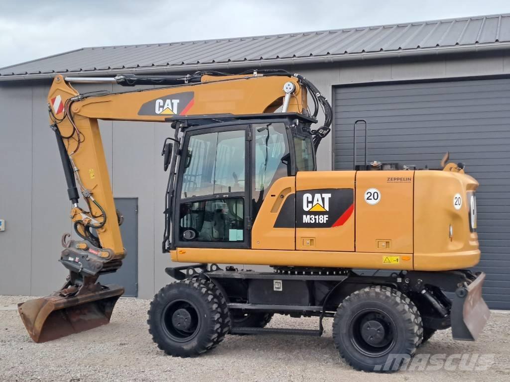 CAT M318F Bageri na kotačima