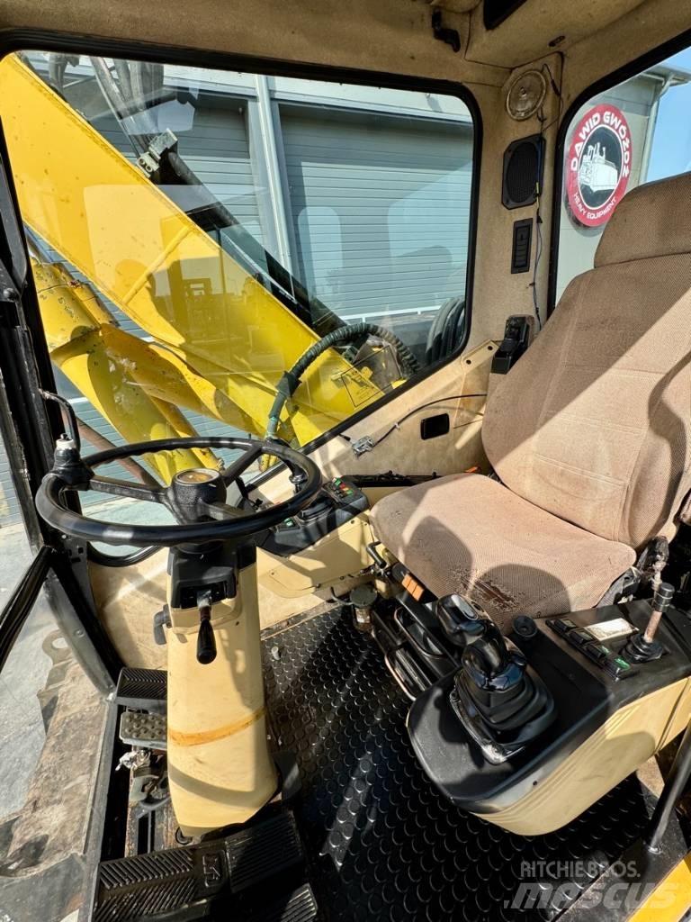 CAT M 312 Bageri na kotačima